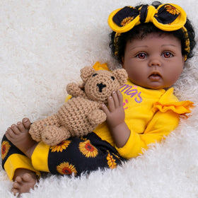 Aori Reborn Baby Doll Black face close-up with warm eyes for gentle companionship.