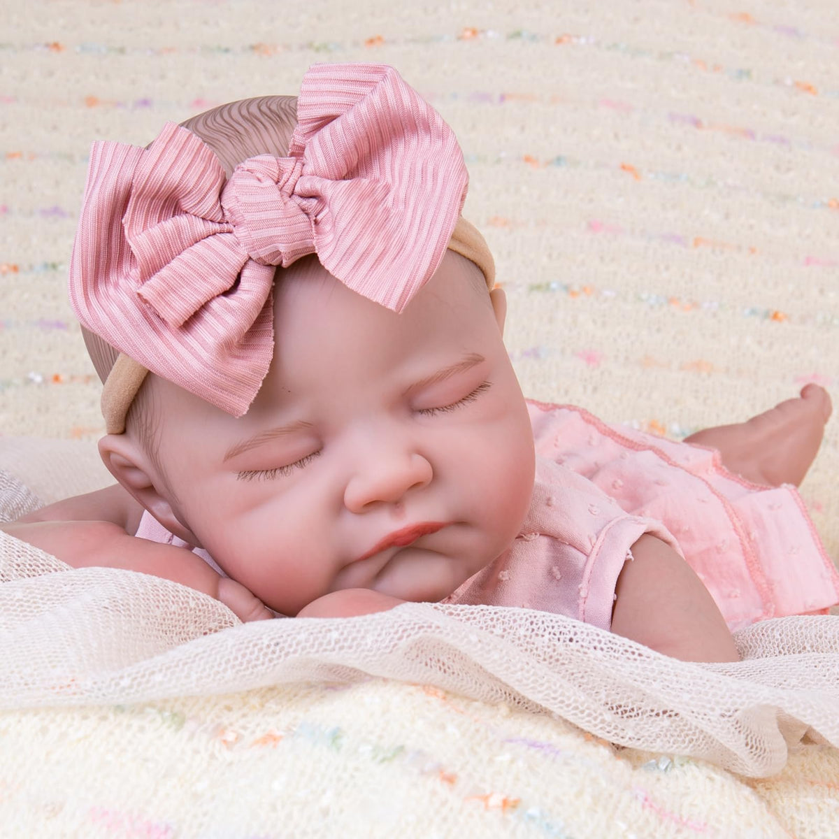 Poseable limbs on the Aori Reborn doll support versatile nurturing role-play