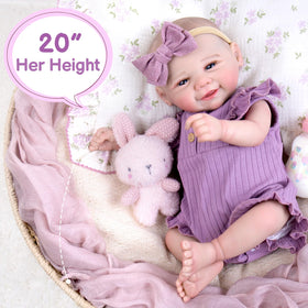 Aori doll dressed in newborn outfit for versatile styling