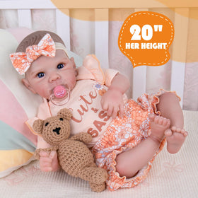 Aori Reborn doll poseable limbs support dynamic dressing and pretend play scenarios.