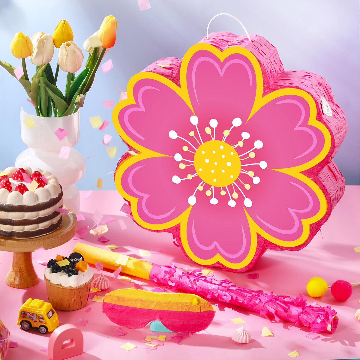 Aoriher daisy pinata being filled with candies and small gifts.