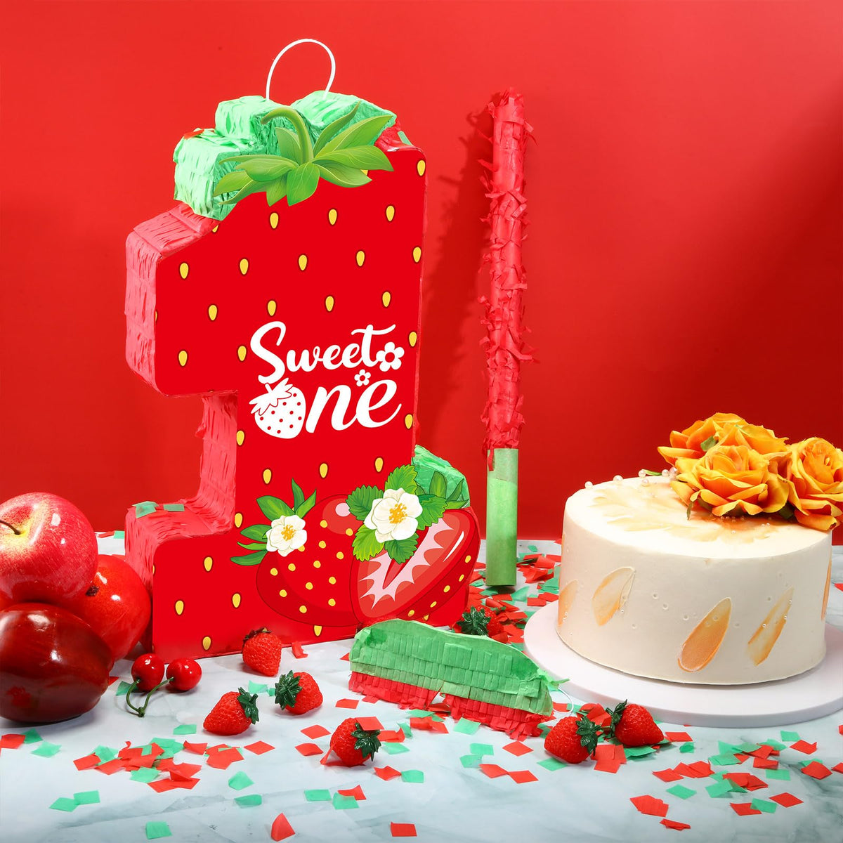 Aoriher Strawberry Piñata tissue paper detail adds bright colors to the setup.