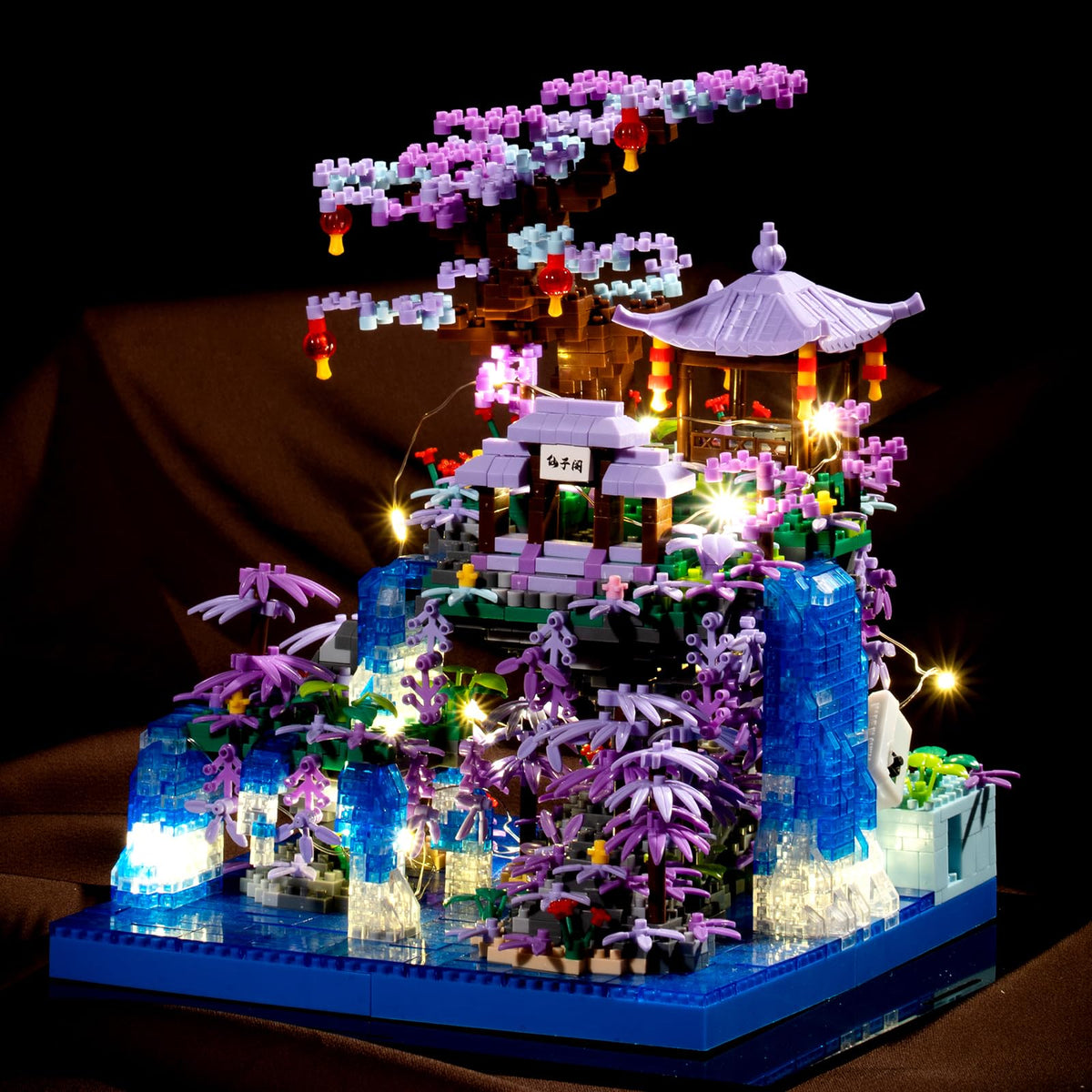 APENGBAOL Peach Blossom Pond waterfall adds a serene night glow to your desk centerpiece.