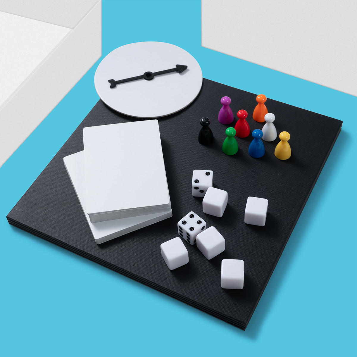 Apostrophe Games Create Your Own Board Game Kit spinner and dice for varied play options.