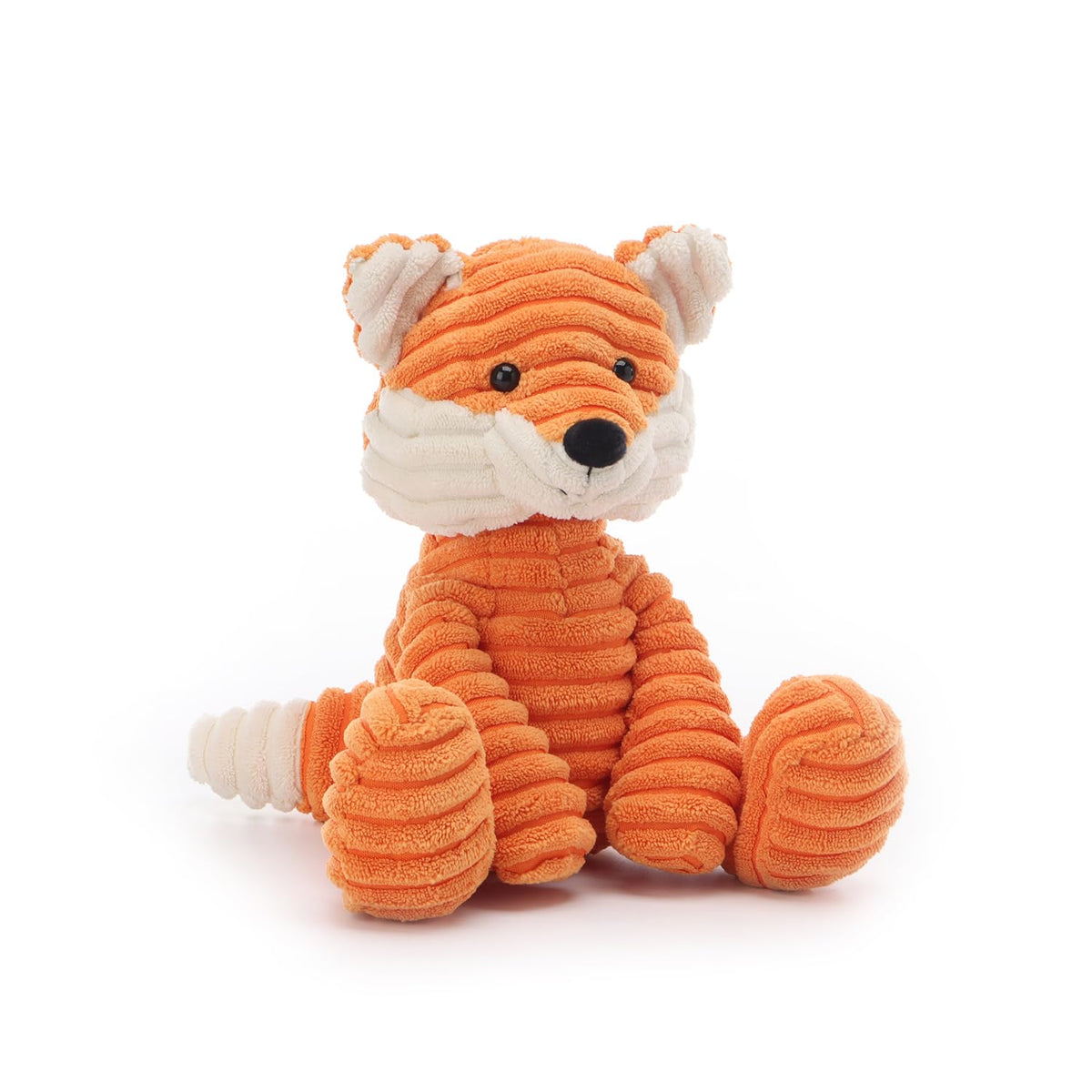 Apricot Lamb fox plush used during playtime by a child for storytelling.