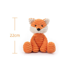 Apricot Lamb corduroy fox in a hugging position inviting cuddly moments.