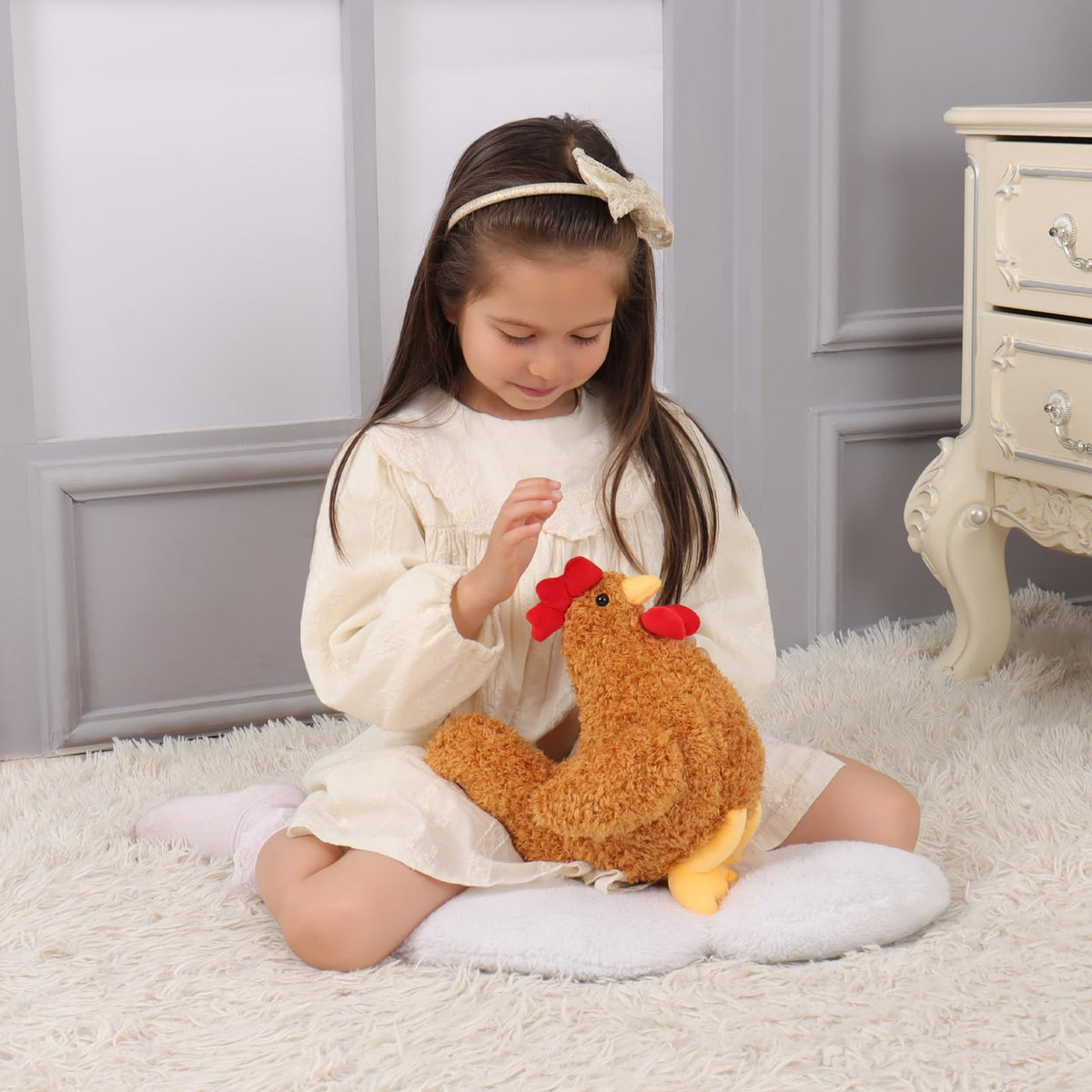 Apricot Lamb Ginger Rooster plush close-up face, inviting soft texture for little hands