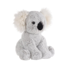 Child hugs the Apricot Lamb koala plush during playtime.