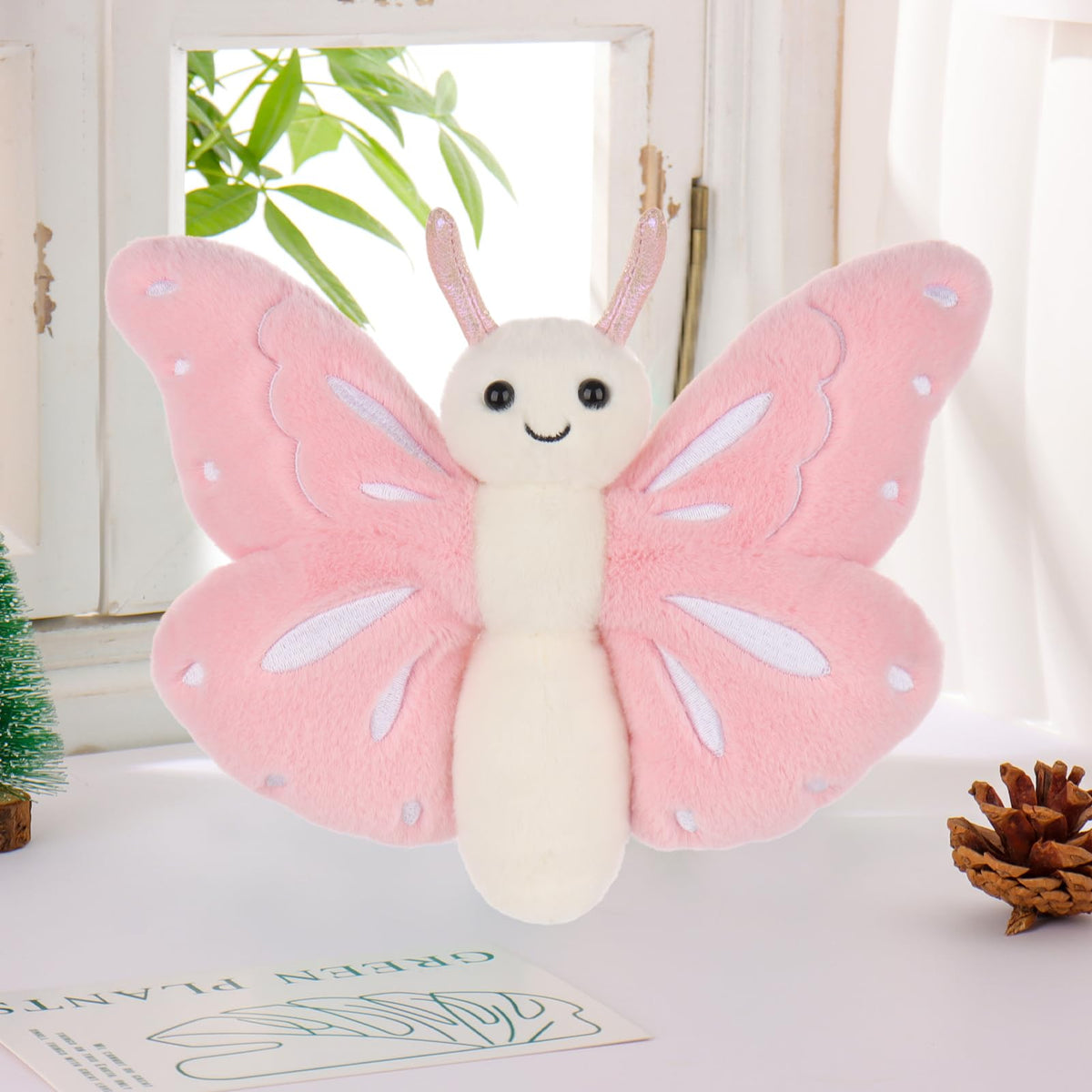 Apricot Lamb Pink Butterfly plush, in-hand image, perfect hug buddy for stories and playtime