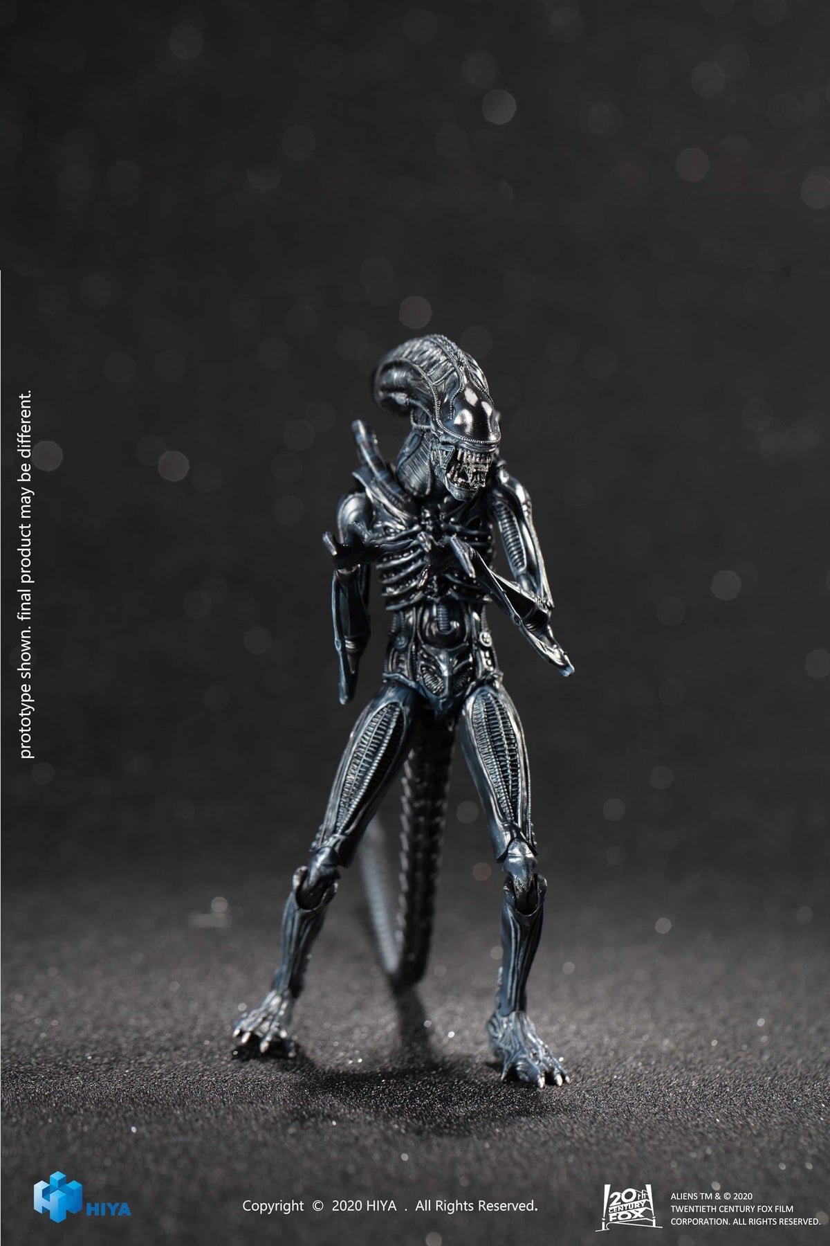 Close-up of blue alien warrior armor showing sculpt and paint depth