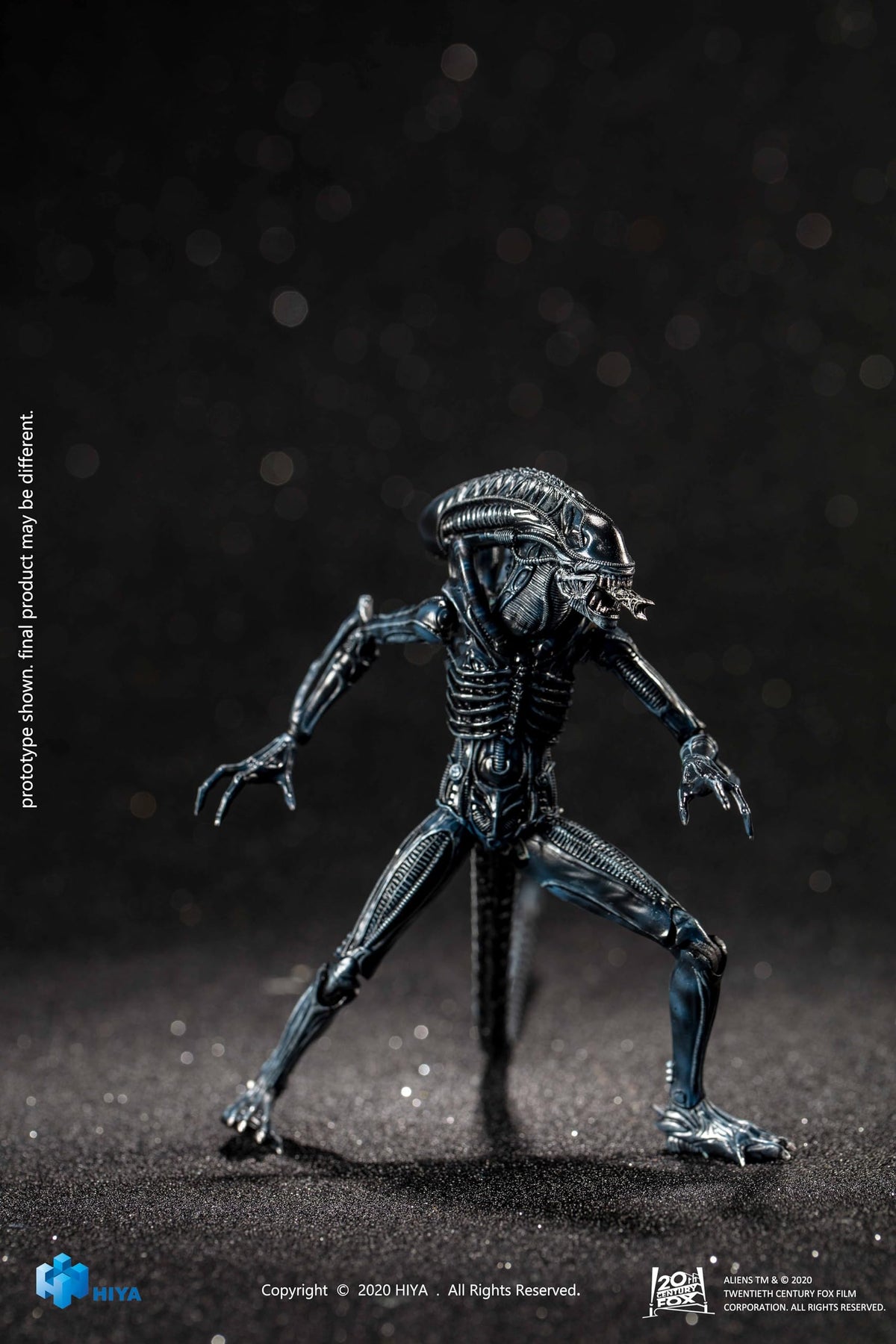 Blue alien figure from Exquisite Mini Series packaging and display-ready presentation