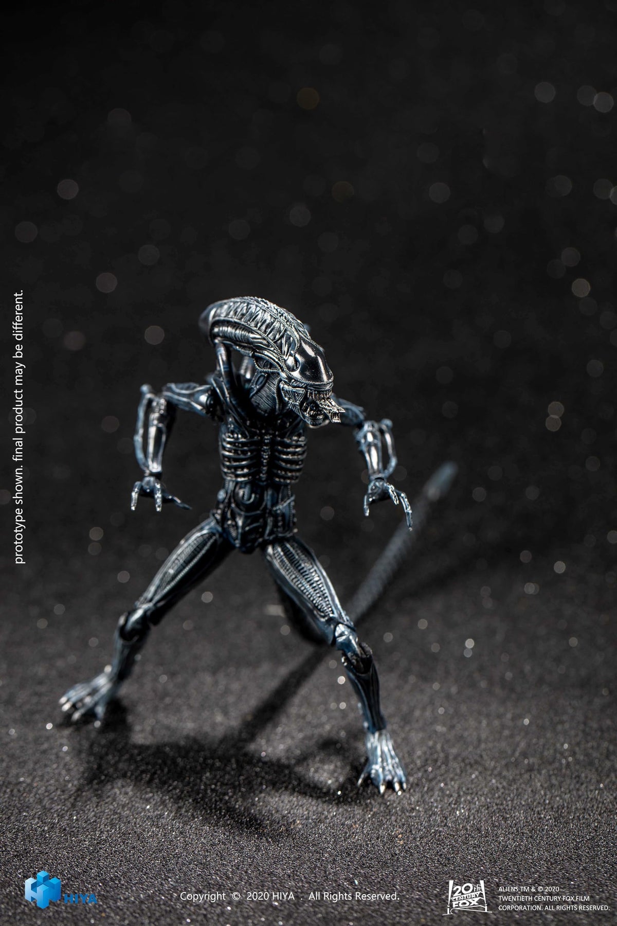 Blue alien warrior shown in window box packaging for collectors