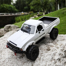 ARRIS WPL C24-1 RC rock crawler front view shows rugged 4x4 chassis for off-road play