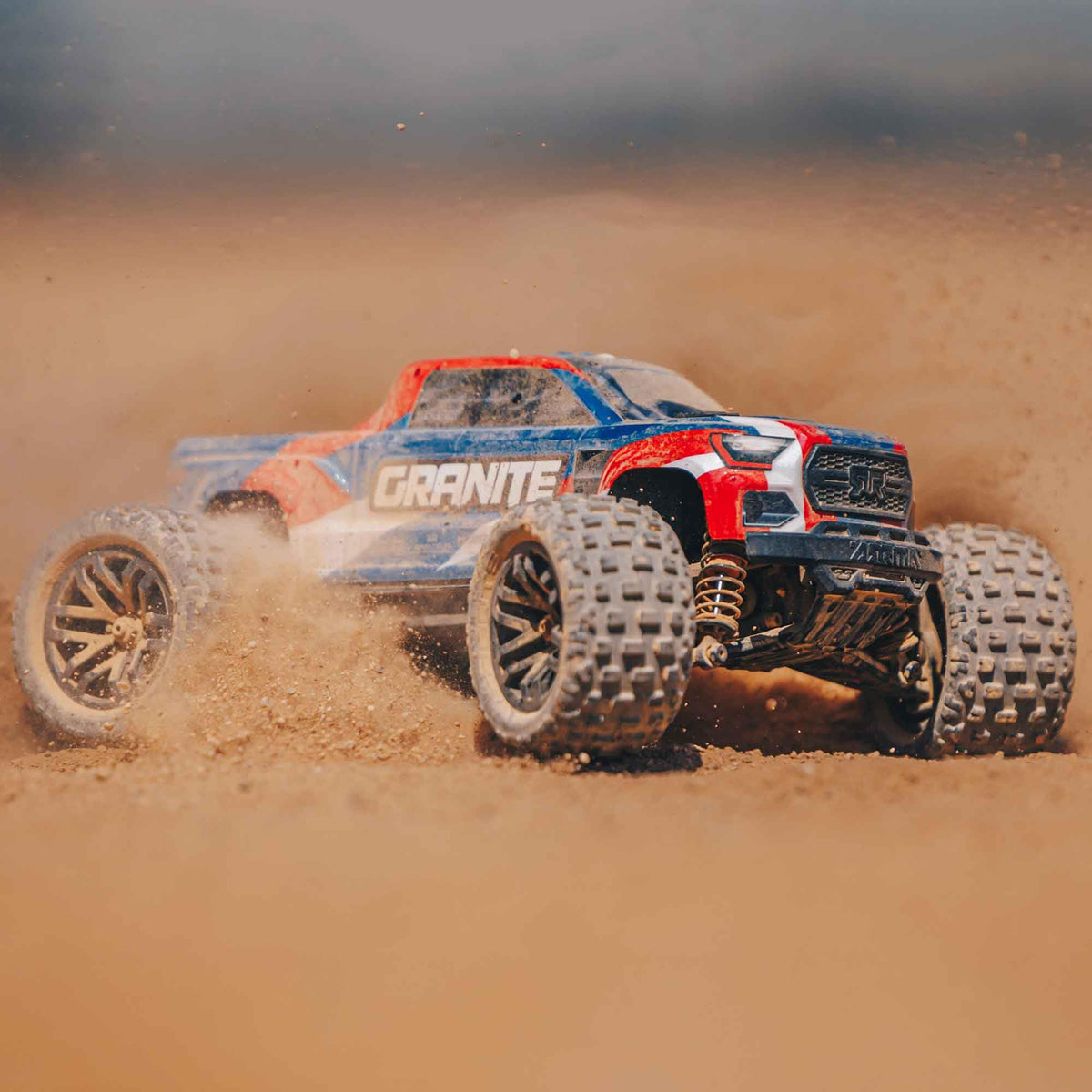 ARRMA Granite GROM 4x4 wheels and tires provide strong grip on varied terrain.