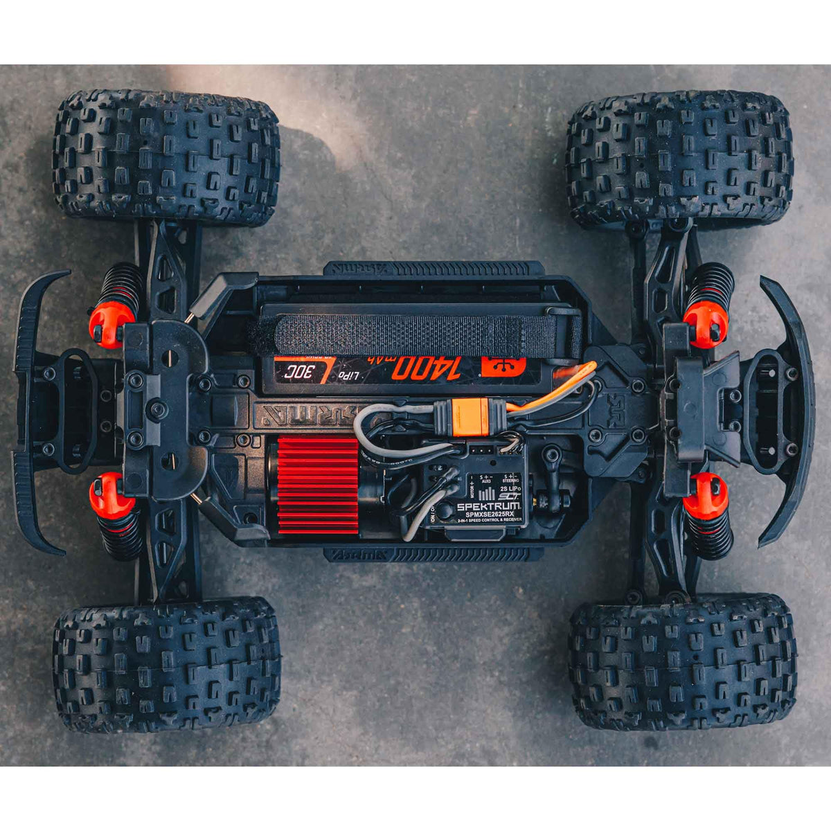 ARRMA Granite GROM oil-filled shocks absorb bumps for smoother handling.