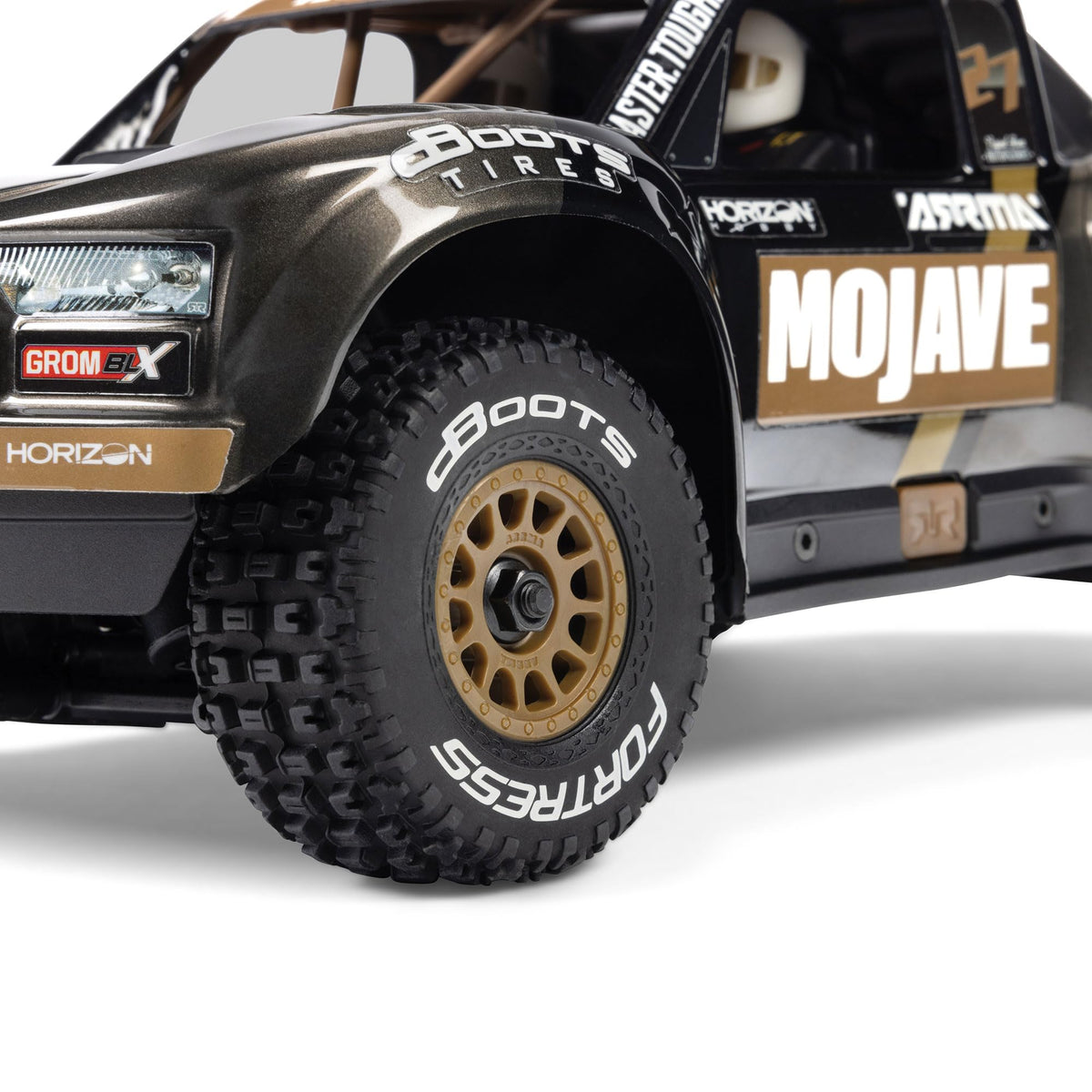 ARRMA Mojave GROM 4x4 chassis detail, robust brushless platform ready for upgrades.