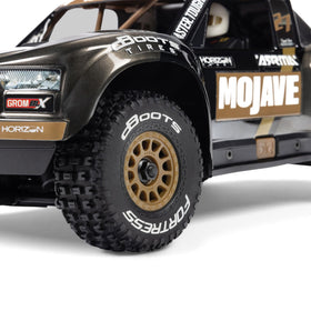 ARRMA Mojave GROM 4x4 chassis detail, robust brushless platform ready for upgrades.