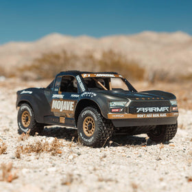 ARRMA Mojave GROM 4x4 wheel close-up, grippy tires for confident traction on loose surfaces.