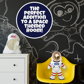 NASA-patched astronaut plush supports imaginative missions during playtime.