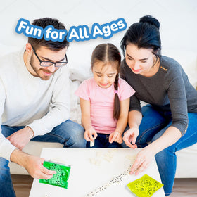 ArtCreativity family game night with dominoes on a table.