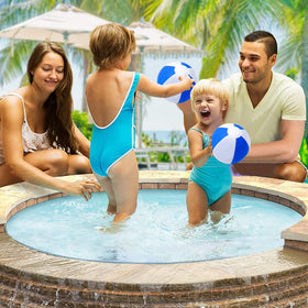 ArtCreativity luau outdoor decor with vibrant beach balls for festive vibes.
