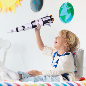 ArtCreativity Saturn Rocket Plush during pretend play supports imaginative exploration.