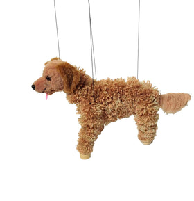 Detachable strings on the Artisan Owl puppet simplify untangling during performances.