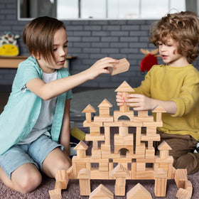 AryiHitt wooden blocks for kids promote hand-eye coordination during castle-building sessions.