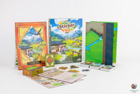 Asmodee Cozy Stickerville sticker book to plant houses and shops.
