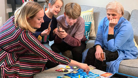 Asmodee Dixit Memories exotic landscapes invite creative narratives.