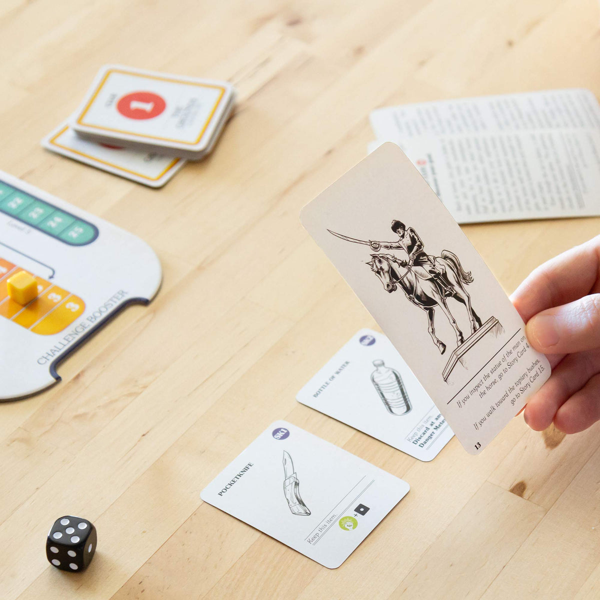 Asmodee House of Danger gameplay scene showing cards and prompts for decision moments
