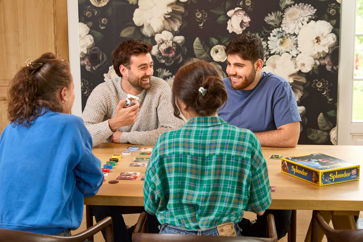 Asmodee Splendor image features players crafting jewelry, illustrating quick, engaging rounds.