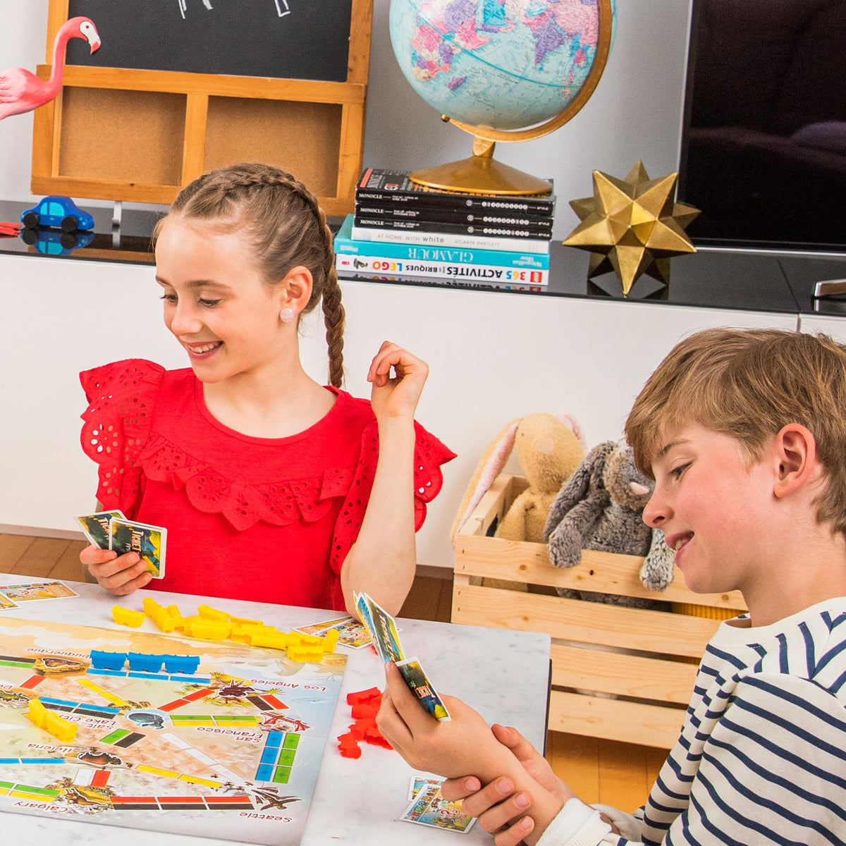 Asmodee Ticket to Ride First Journey golden-ticket image implying reward finish