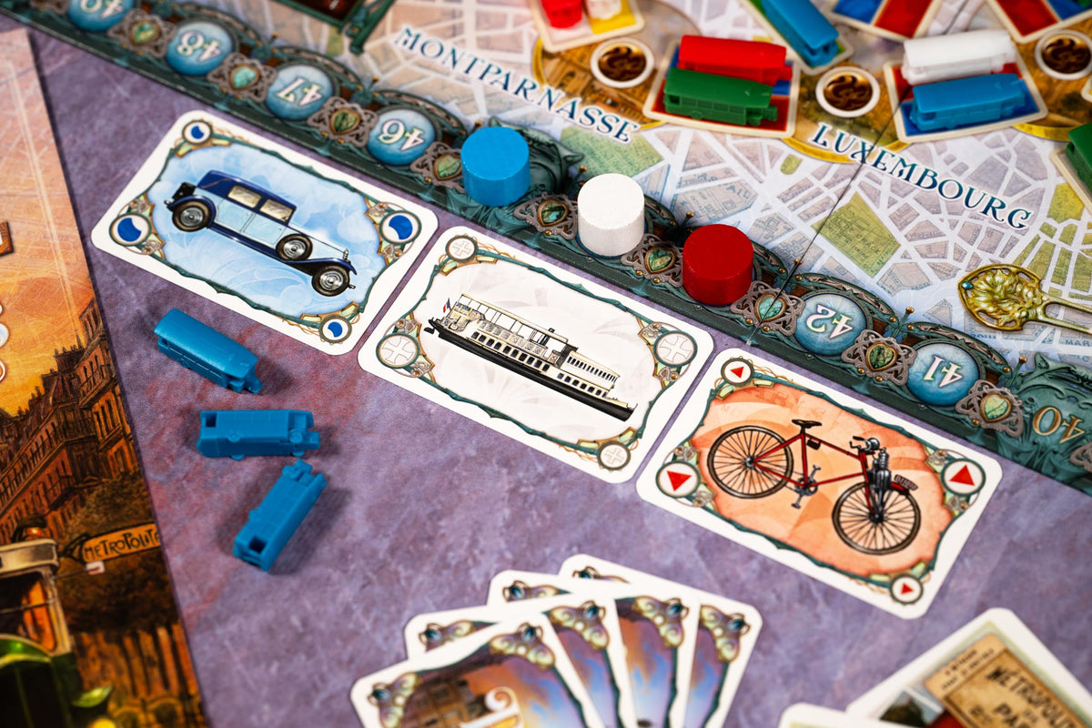 Asmodee Ticket to Ride Paris board and pieces emphasizing portability for travel