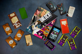 Asmodee UNLOCK! Heroic Adventures components close-up with cards and clues.