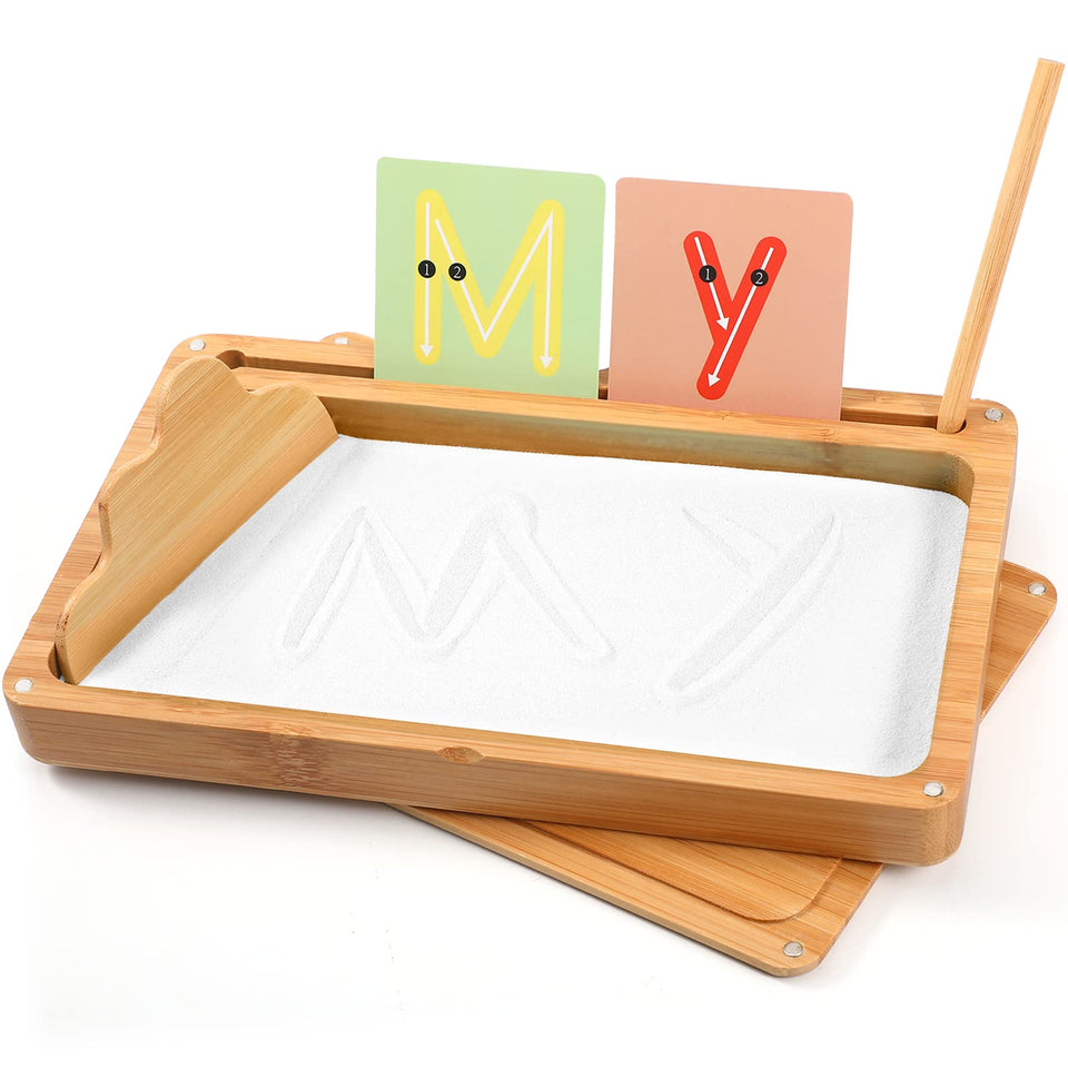 AtMini sand tray with wooden lid for organized, mess-free classroom letter practice.