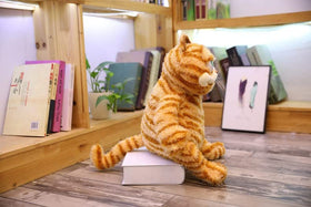 ATOKNG Soft fabric cat plush close-up, durable and cuddle-worthy.