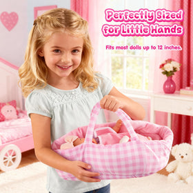 AuntyFey child playing with doll promotes caregiving and social skills.