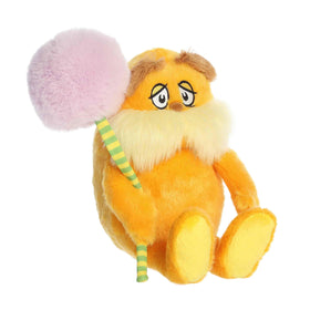 Aurora Lorax plush holding Truffula flower, ideal for storytelling moments.