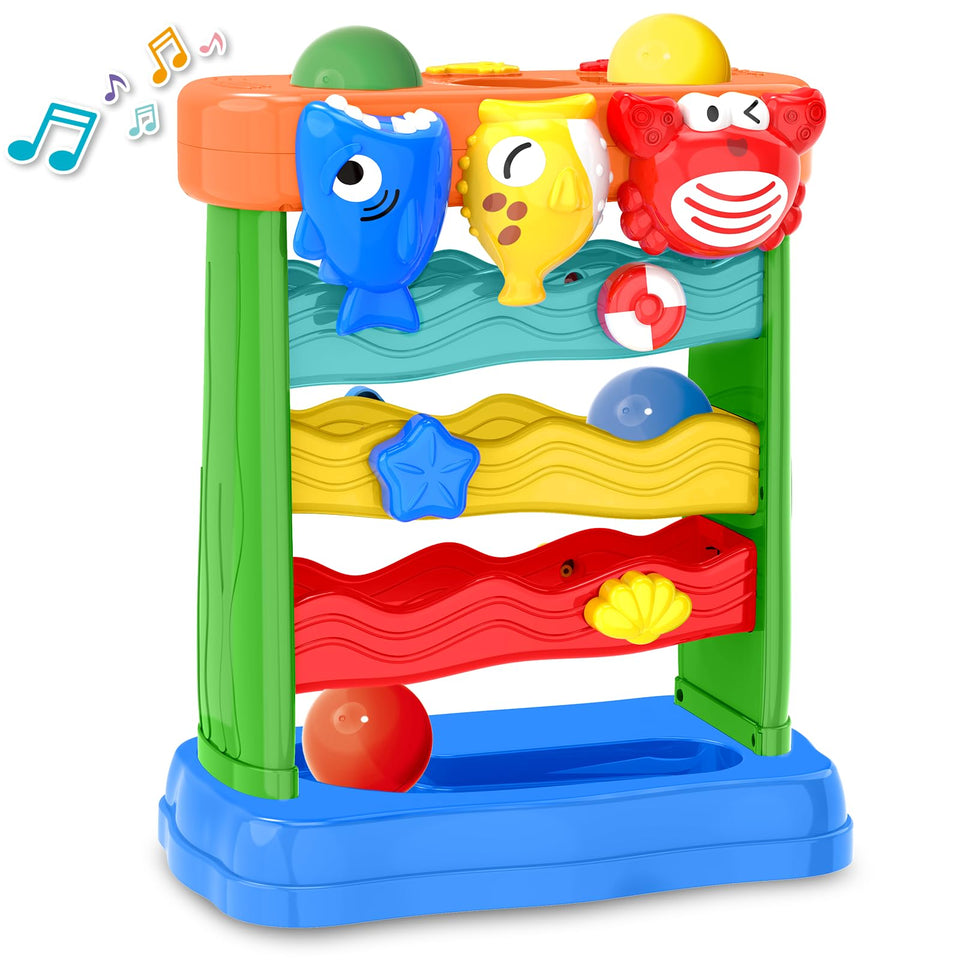 AuroTops ball drop toy blue shark design encourages coordination and exploration.