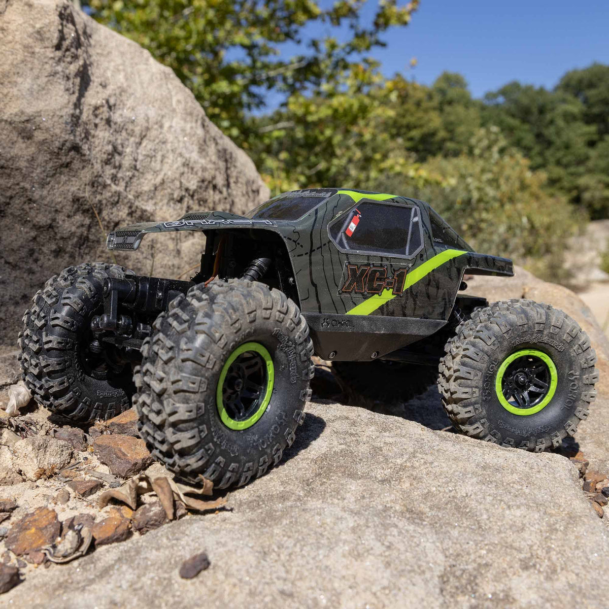 Axial AX24 XC-1 rockster wheels and rock lizards tires grip terrain.