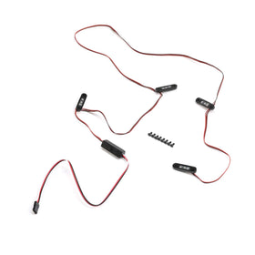 Axial AXI13001 rock lights with controller illuminate off-road SCX10 III with vibrant color options.