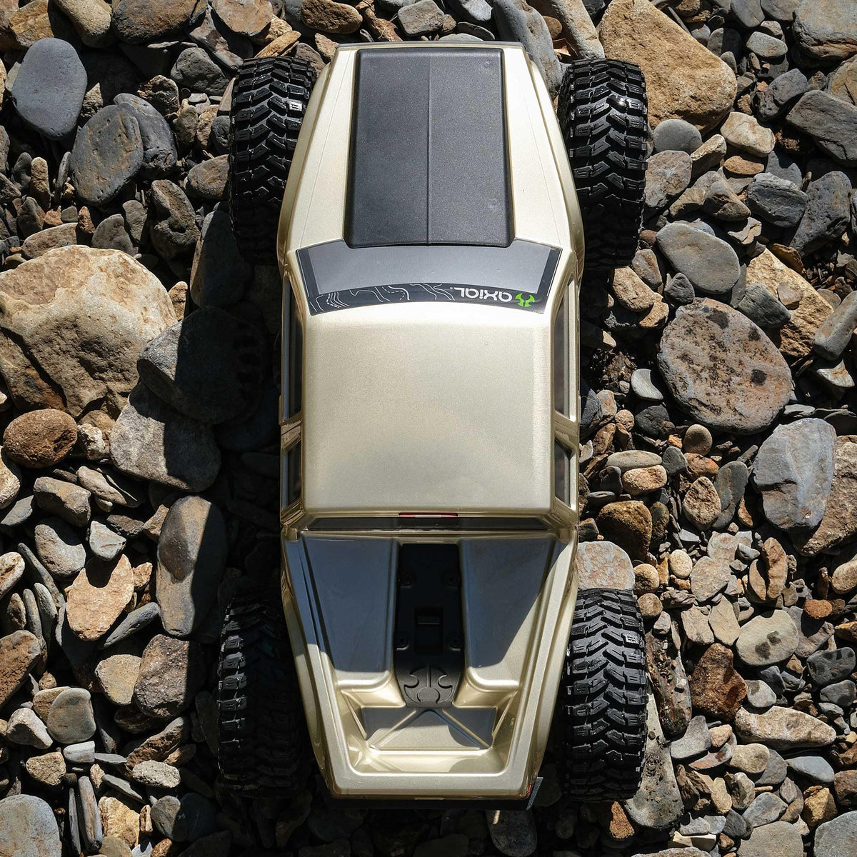 Axial SCX10III c-channel chassis provides rigid support on rough terrain.