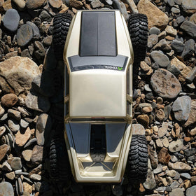 Axial SCX10III c-channel chassis provides rigid support on rough terrain.