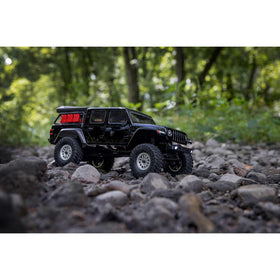 Axial SCX24 oil-filled shocks offer smoother crawling.