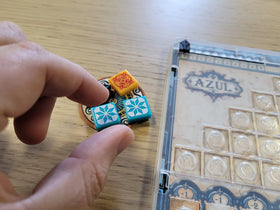 Azul Mini players interact as they draft tiles and block opponents.