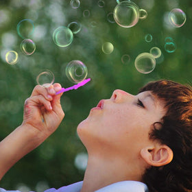 B bangcool bubble wands beside the beach delivering big, bright bubbles.