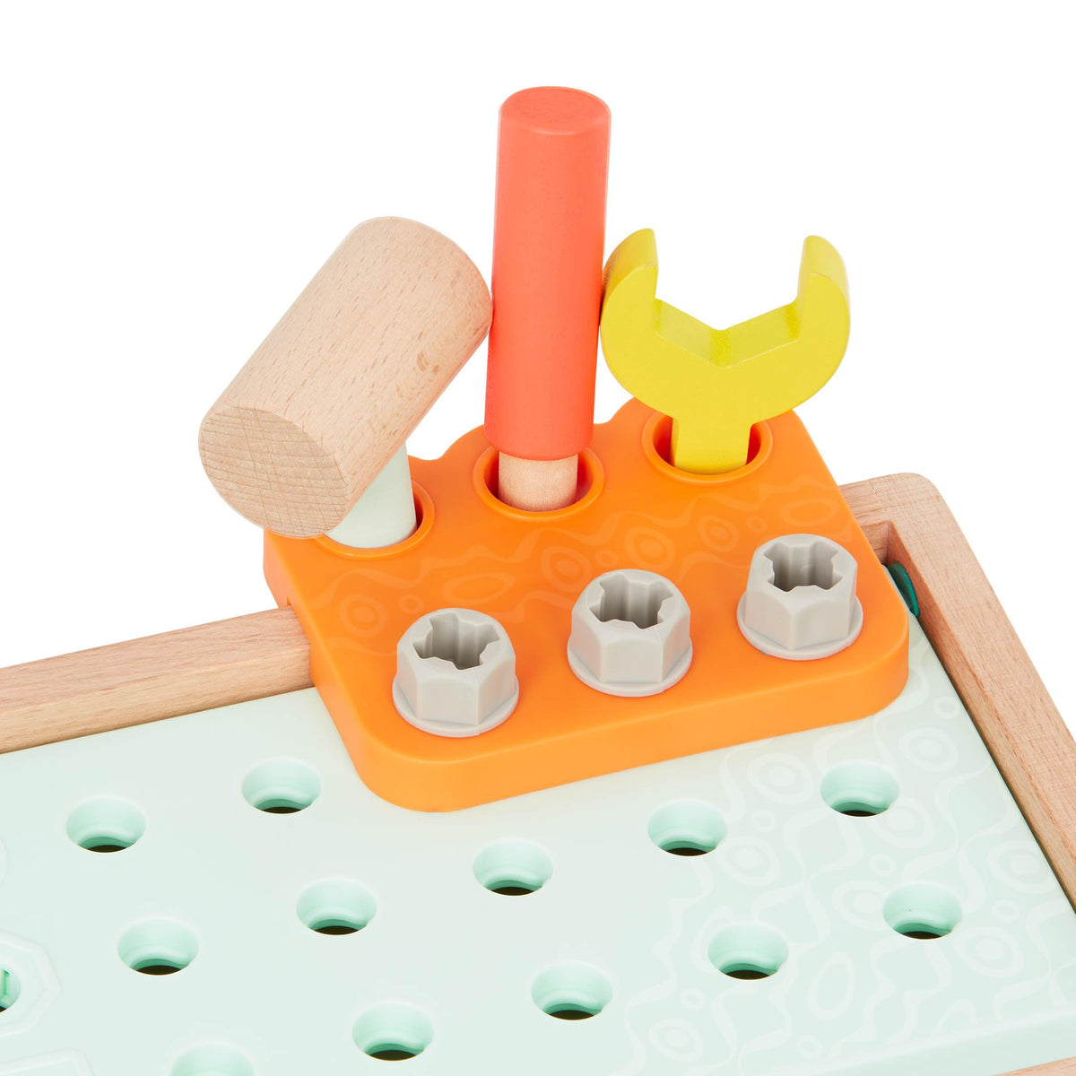 B. toys Fix-n-Play Kit tool holder keeps pieces within reach.