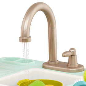 B. toys Splash-n-Scrub Sink play food pieces for complete pretend meals.