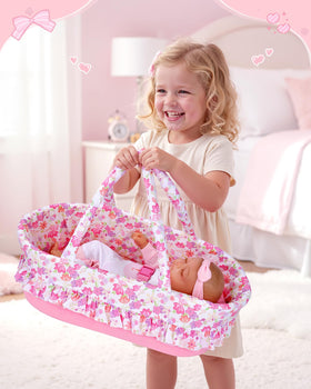 BABESIDE bassinet built-in carrier shown for easy transport during play.